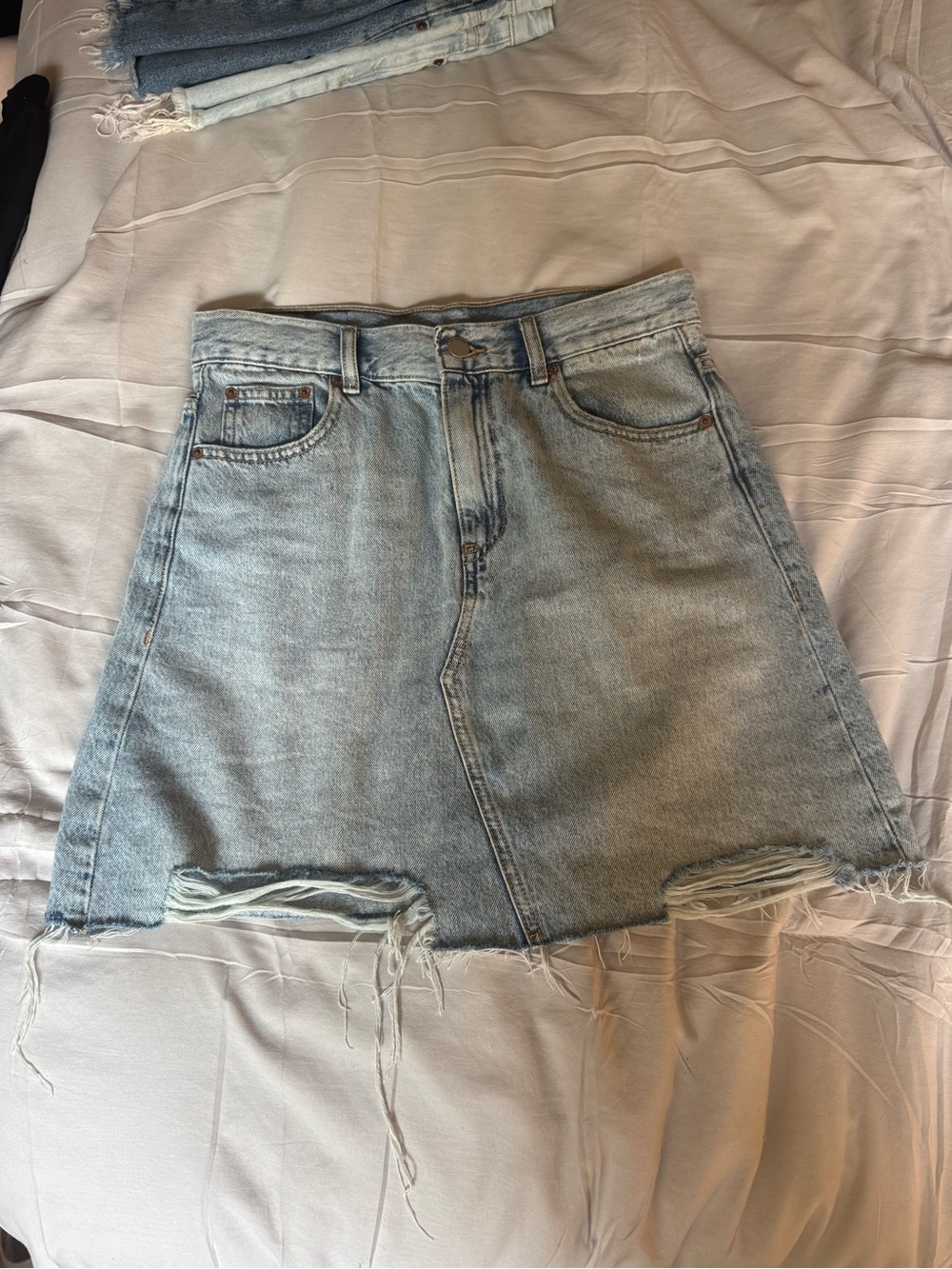 Light Wash Distressed Denim Skirt